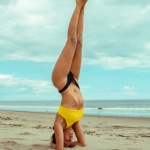 balance a crown chakra headstand pose