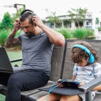 man and kid electronic devices testing EMF protection